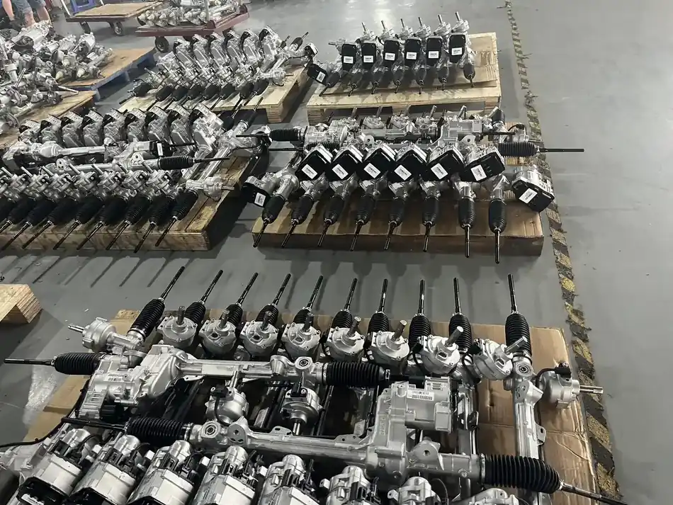 Rows of steering rack assemblies held in stock by part number