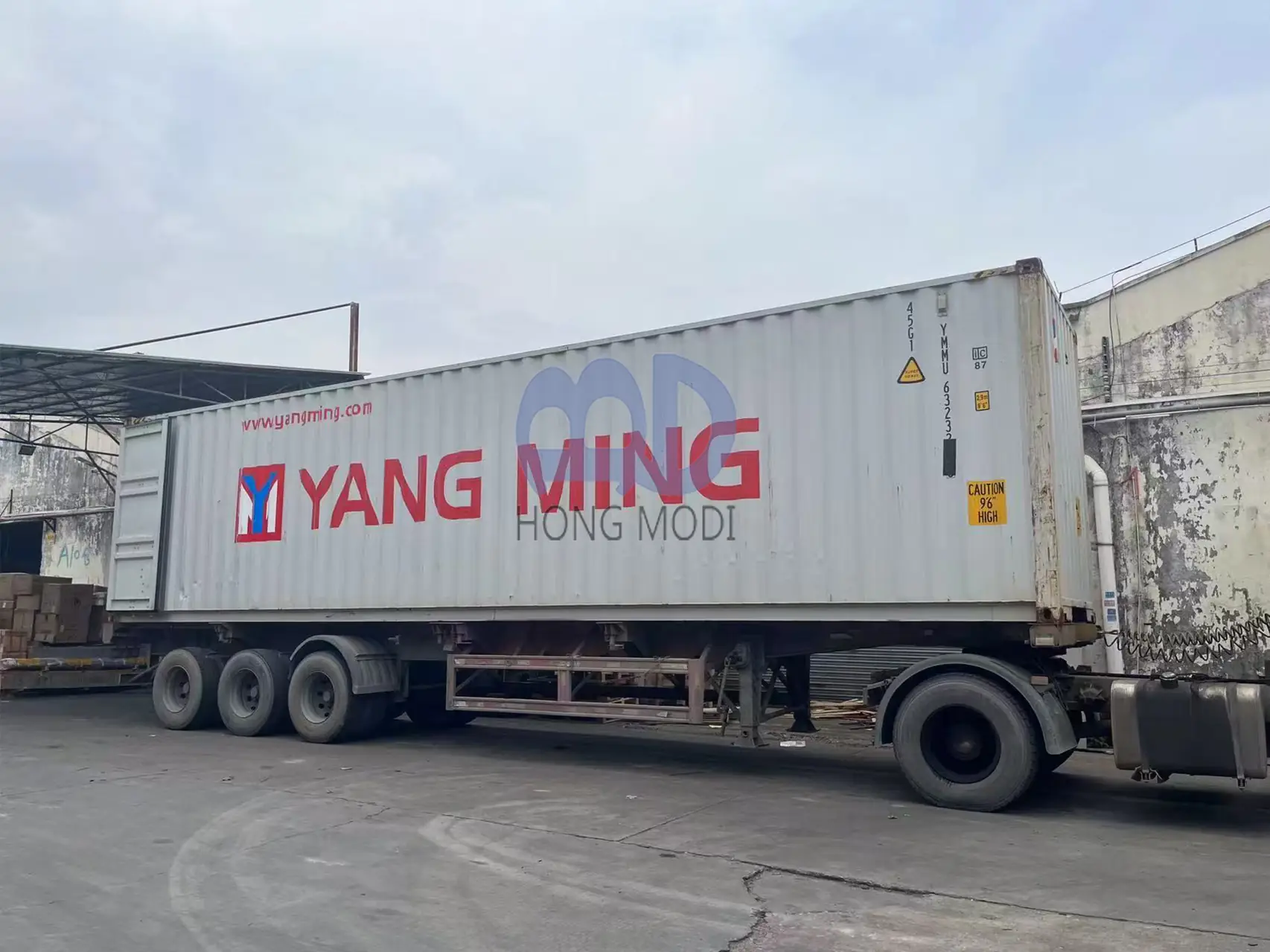 Loaded export container on a truck leaving the despatch yard
