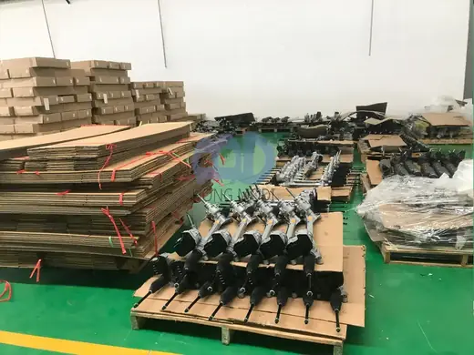 Wooden crates of steering racks stacked and strapped for export