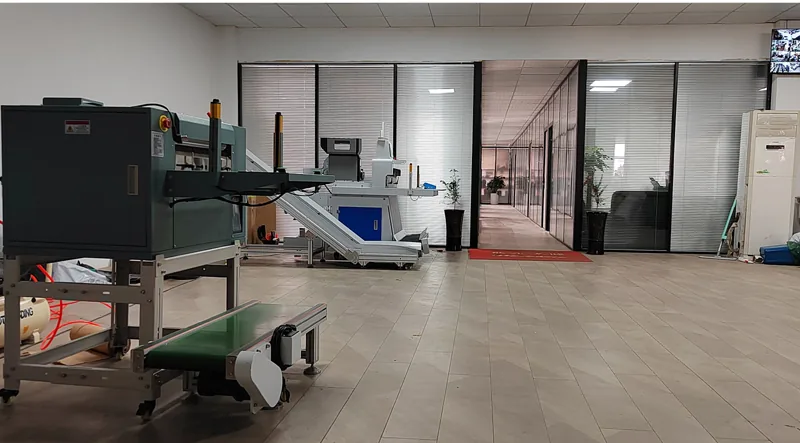 Emerson Machinery workshop with paper converting machines and finished paper rolls