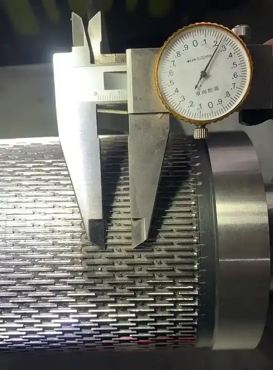 Embossed paper bubble measured with a caliper during inspection