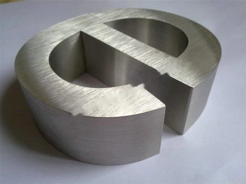 Brushed Stainless Steel relief lettering sign, reference 145, photographed in the Super Enseigne workshop