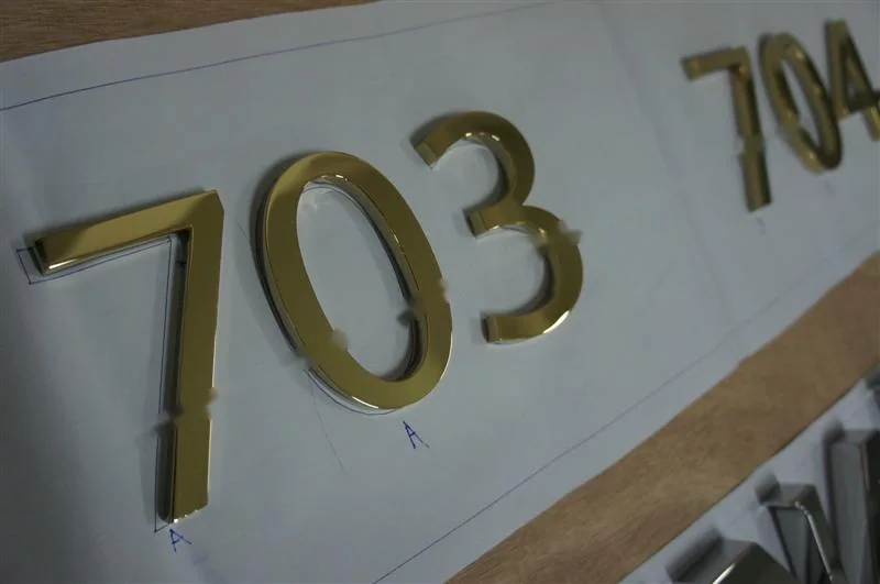 Mirror Polished Stainless Steel box letter sign, reference 219, photographed in the Super Enseigne workshop