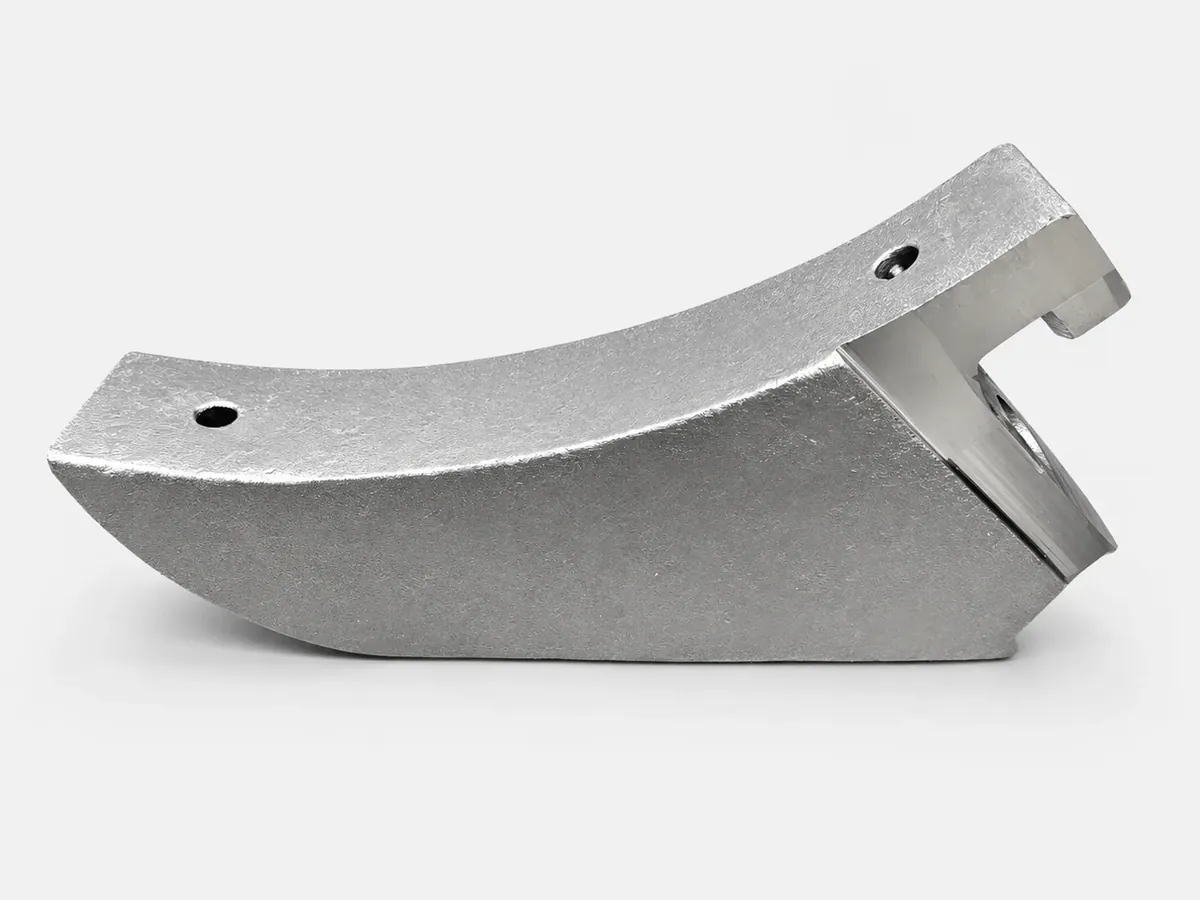 Precision cast part with complex curved surface geometry