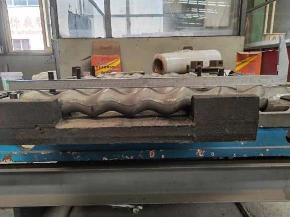 Screw pump rotor set up for dimensional inspection
