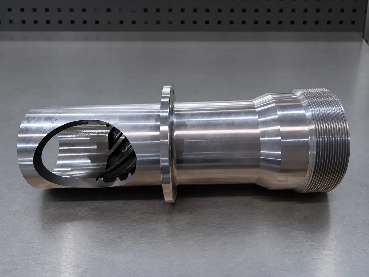Machined stainless steel rotating drive component with splined end