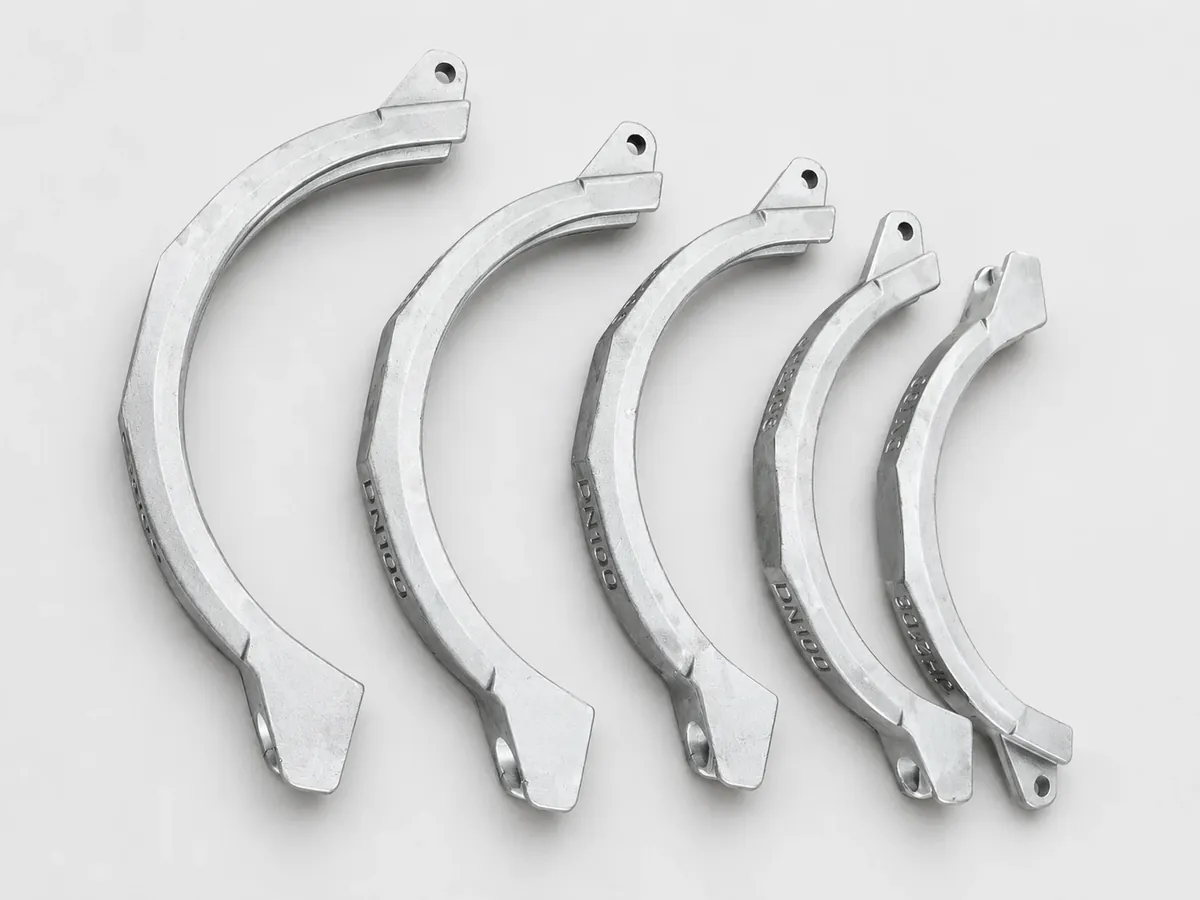 Set of thin wall curved precision castings in stainless steel