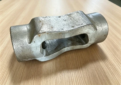 Closed die forged connector component with twin bosses