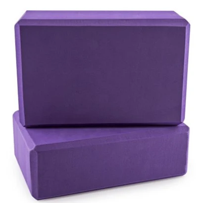 Two purple high density EVA yoga bricks stacked