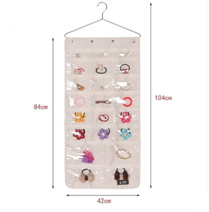 Hanging jewelry organizer with dimensions 104 cm by 42 cm and 84 cm by 42 cm marked