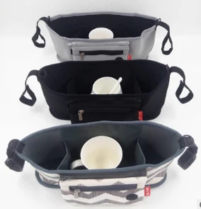Three grab and go stroller organizers in different fabrics