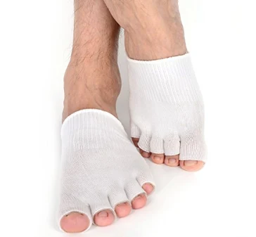 White open toe separating socks worn on both feet
