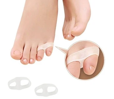 Gel toe separators fitted between toes with an inset detail view