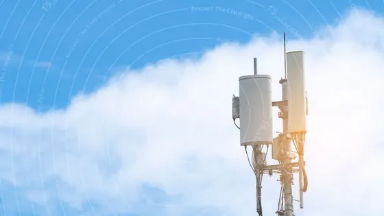 Telecommunications tower against a blue sky