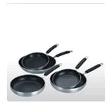 Three polished aluminium frypans in graduated sizes with dark non stick interiors