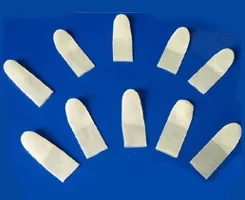 Nine natural latex finger cots in assorted sizes arranged on a blue ground