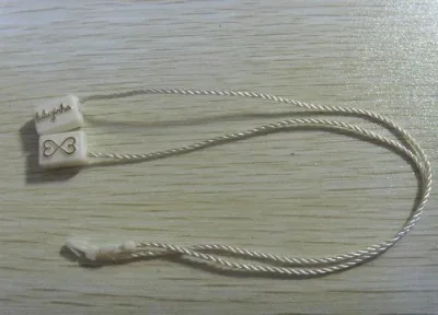 Clothing Plastic String Hang Tag Seal Tablets supplied by BY Boyuan