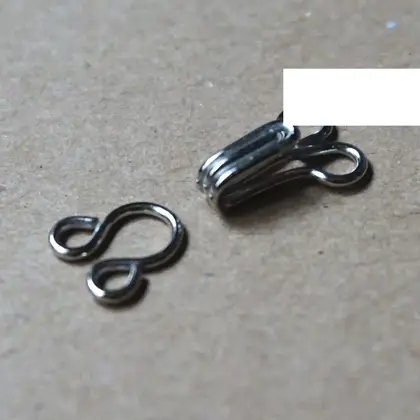 Copper Spring Collar Hook Button on the Invisible Underwear detail view 2