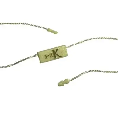 Embossed Gold Logo Seal Tag detail view 3