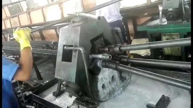 Vernier caliper measuring fin pitch on a finned tube