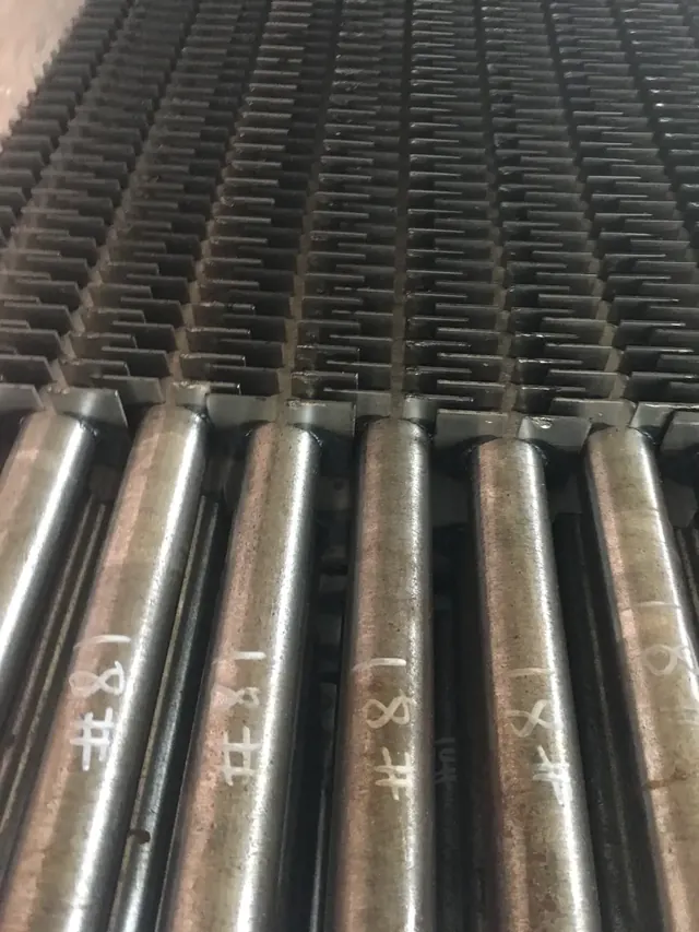 H type fin tube with square fins welded on in halves, leaving the ash lane