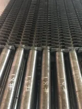 H type fin tube with square fins welded on in halves, leaving the ash lane