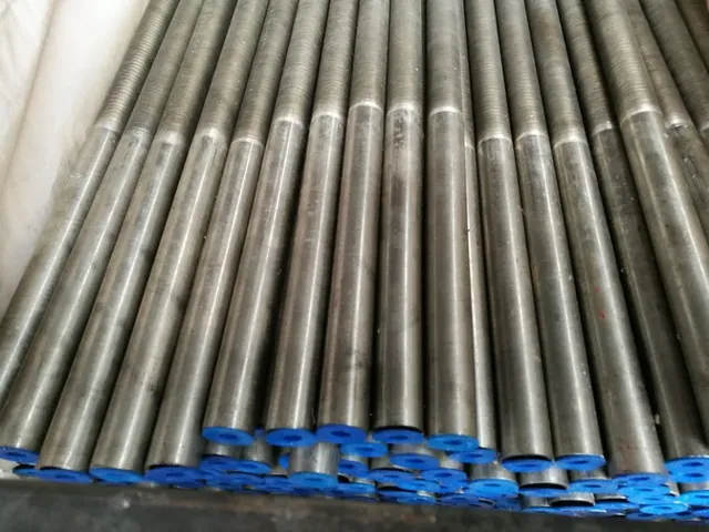 Integral low finned tube lengths after rolling