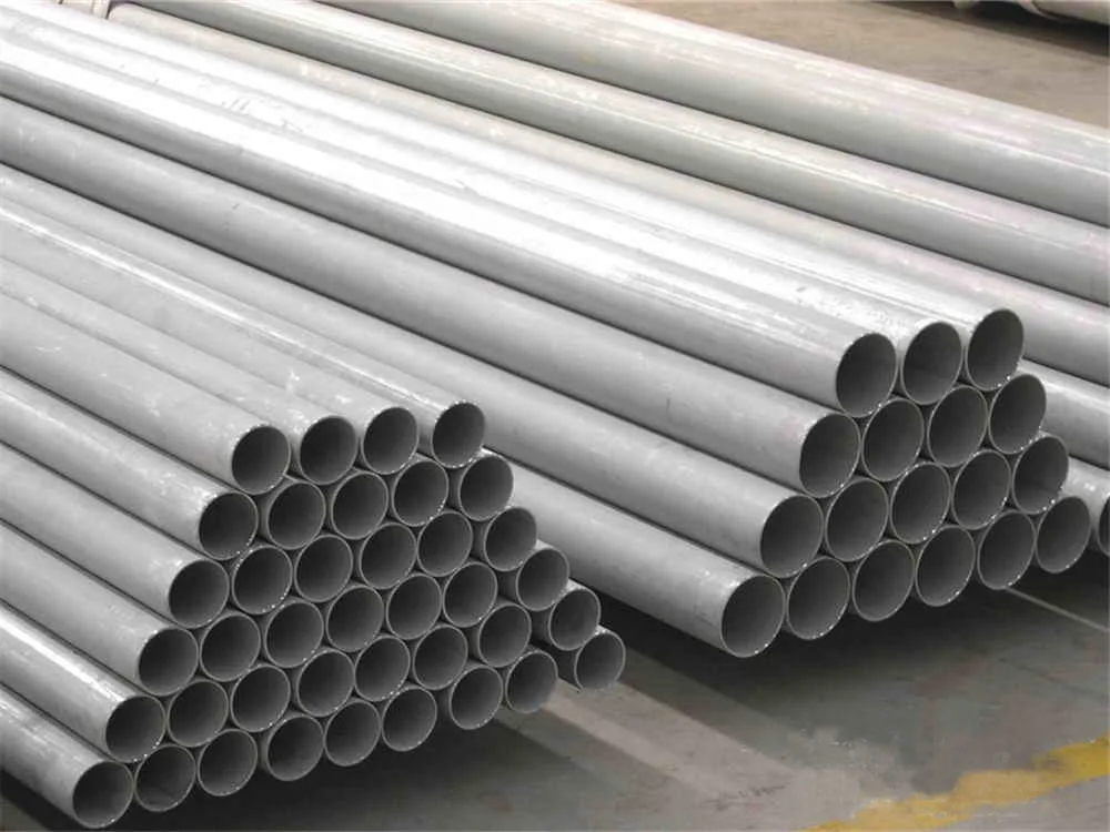Stack of seamless stainless steel tubes showing the tube ends