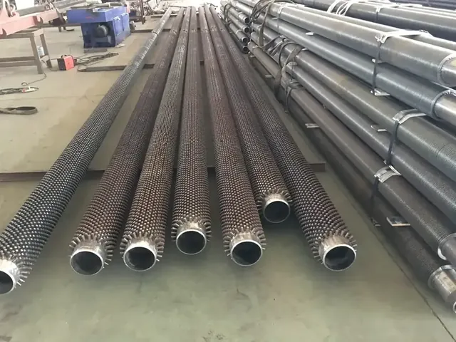 Stud fin tube showing stud pitch and stud height
