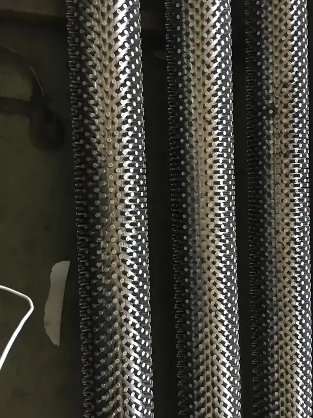 Stud fin tube with individually welded studs across the tube surface