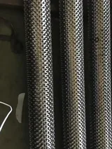 Stud fin tube with individually welded studs across the tube surface