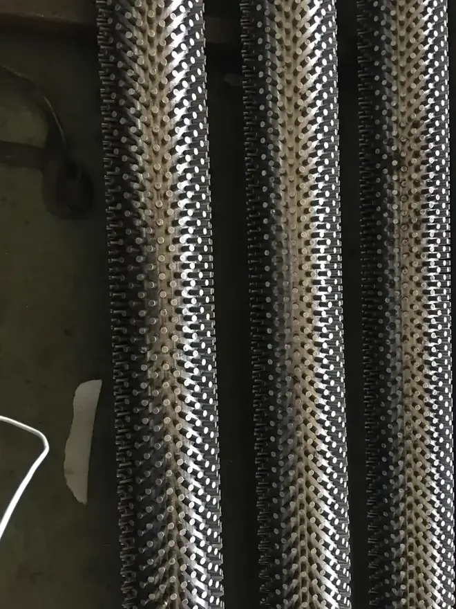 Stud fin tube with individually welded studs across the tube surface