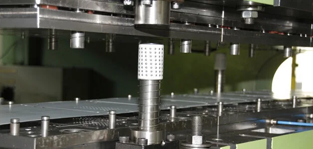 Die cast and machined metal components