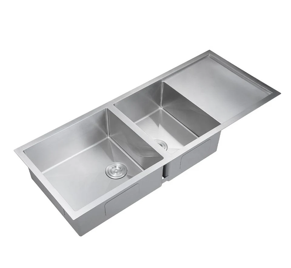 Long double bowl stainless steel sink with an integrated ribbed drainboard