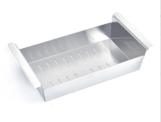 Stainless steel drainer basket that sits on the sink ledge