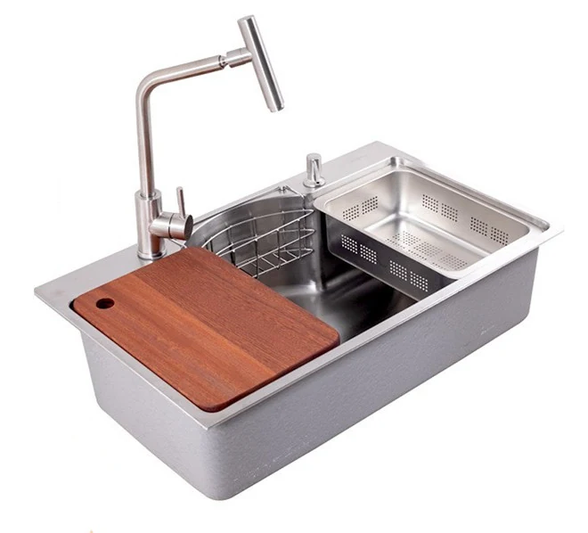 Japanese style multifunction sink with a raised pedestal faucet and sliding board