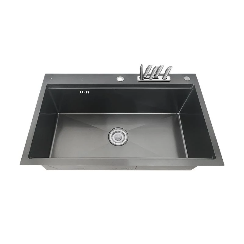 Black finish topmount kitchen sink with a knife block moulded into the deck