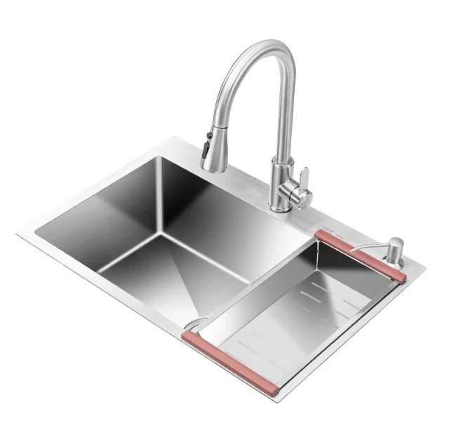 Single bowl topmount sink fitted with a pull-down mixer and ledge accessories
