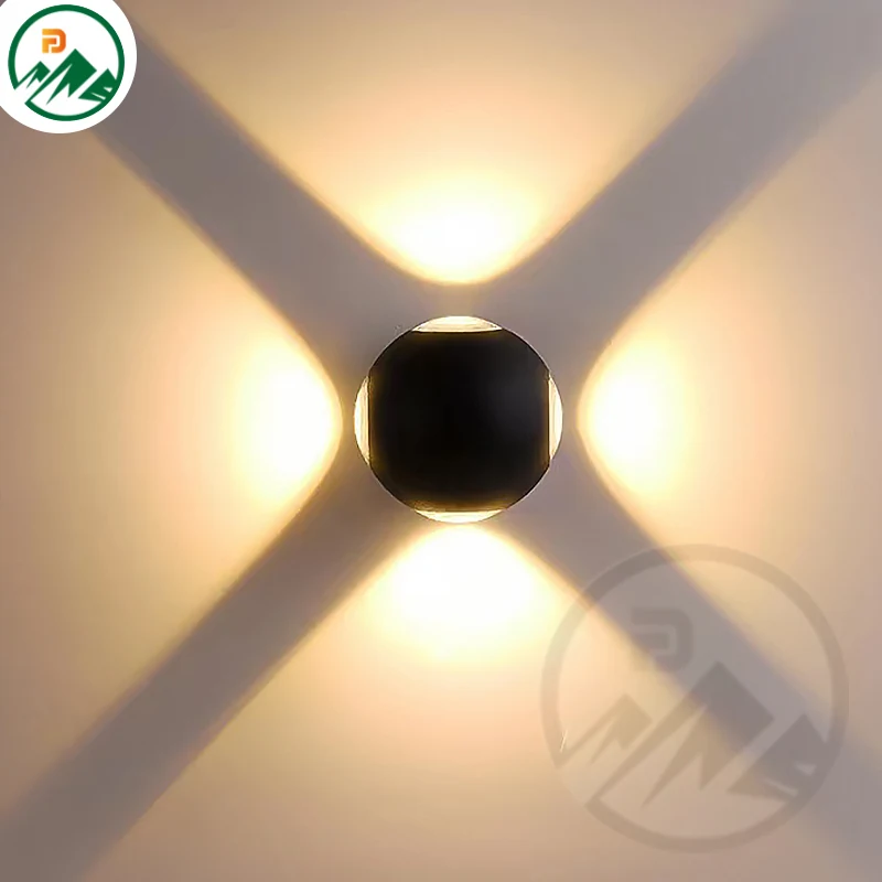 12W modern design IP65 outdoor LED wall lamp mounted on a building facade