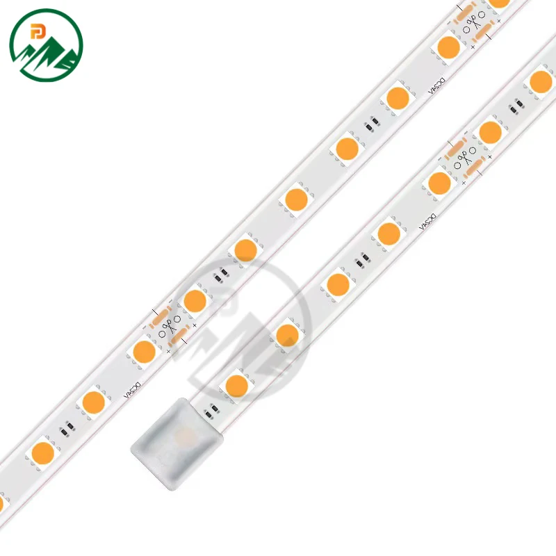 Linear LED strip installed in a ceiling cove in a commercial office space
