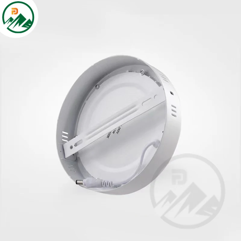 Close-up of the circular aluminium housing and clean finish of the ceiling light