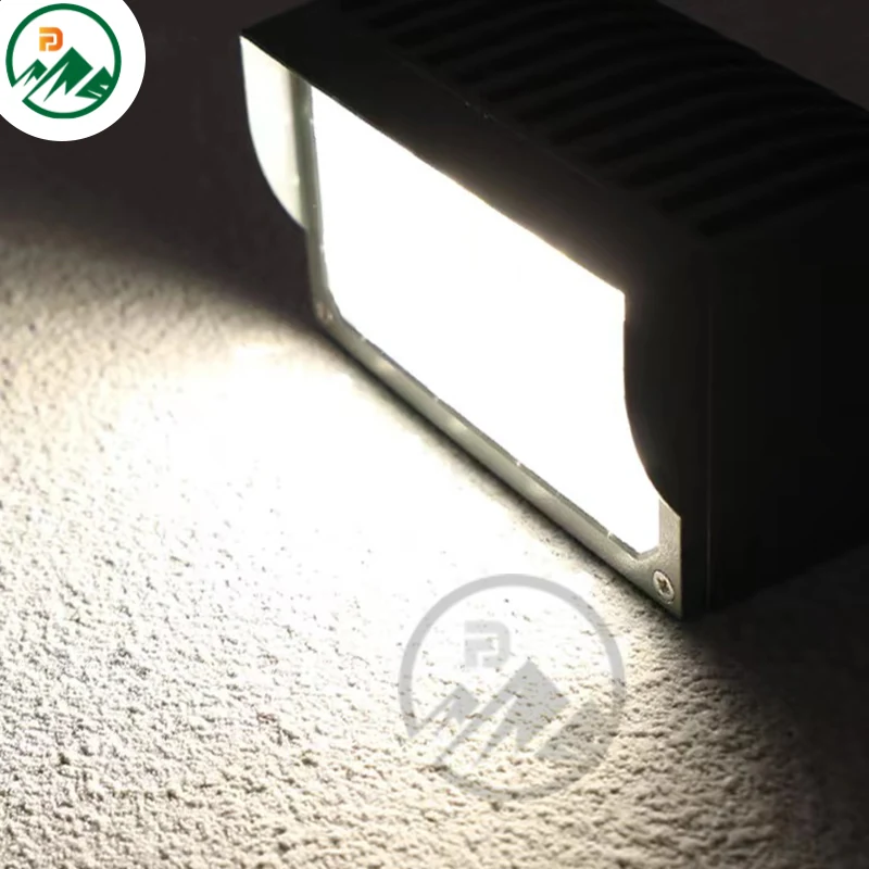 Detail of the IP65 sealed joints and cable entry point on the wall lamp