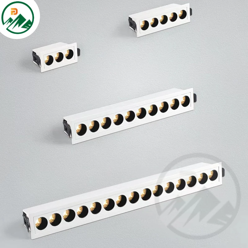 Recessed office linear light installed in a suspended ceiling grid