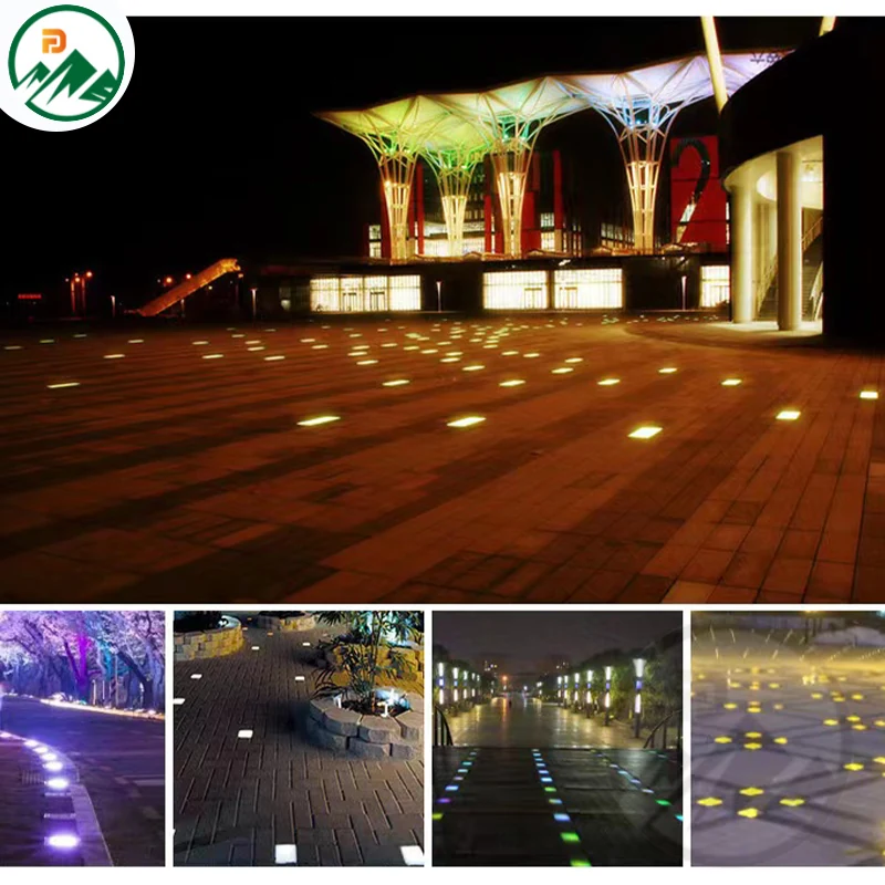 Installation of the underground light in a paved courtyard at night