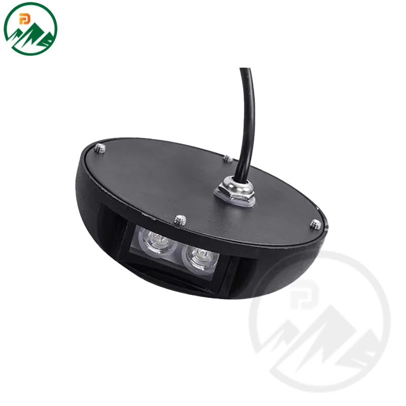 Recessed step light installed in paving with the cover flush with the surface