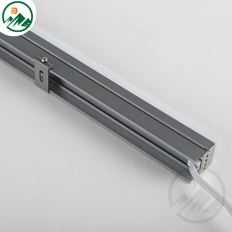 Linear LED light installed along a building edge with a narrow 10*60° beam