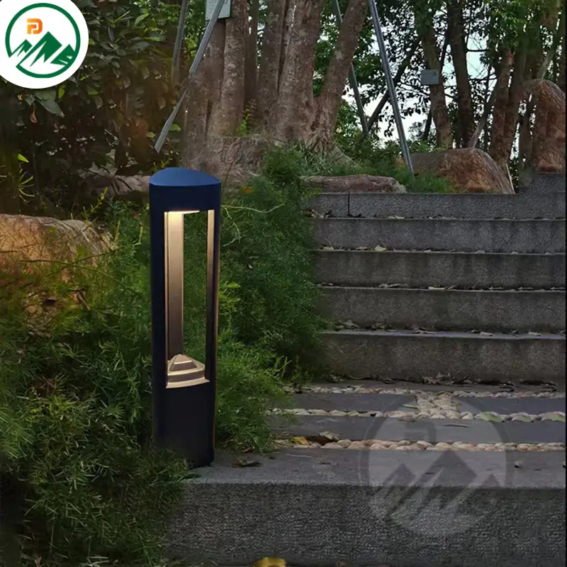 LED garden light installed in a garden setting, illuminating shrubs at night