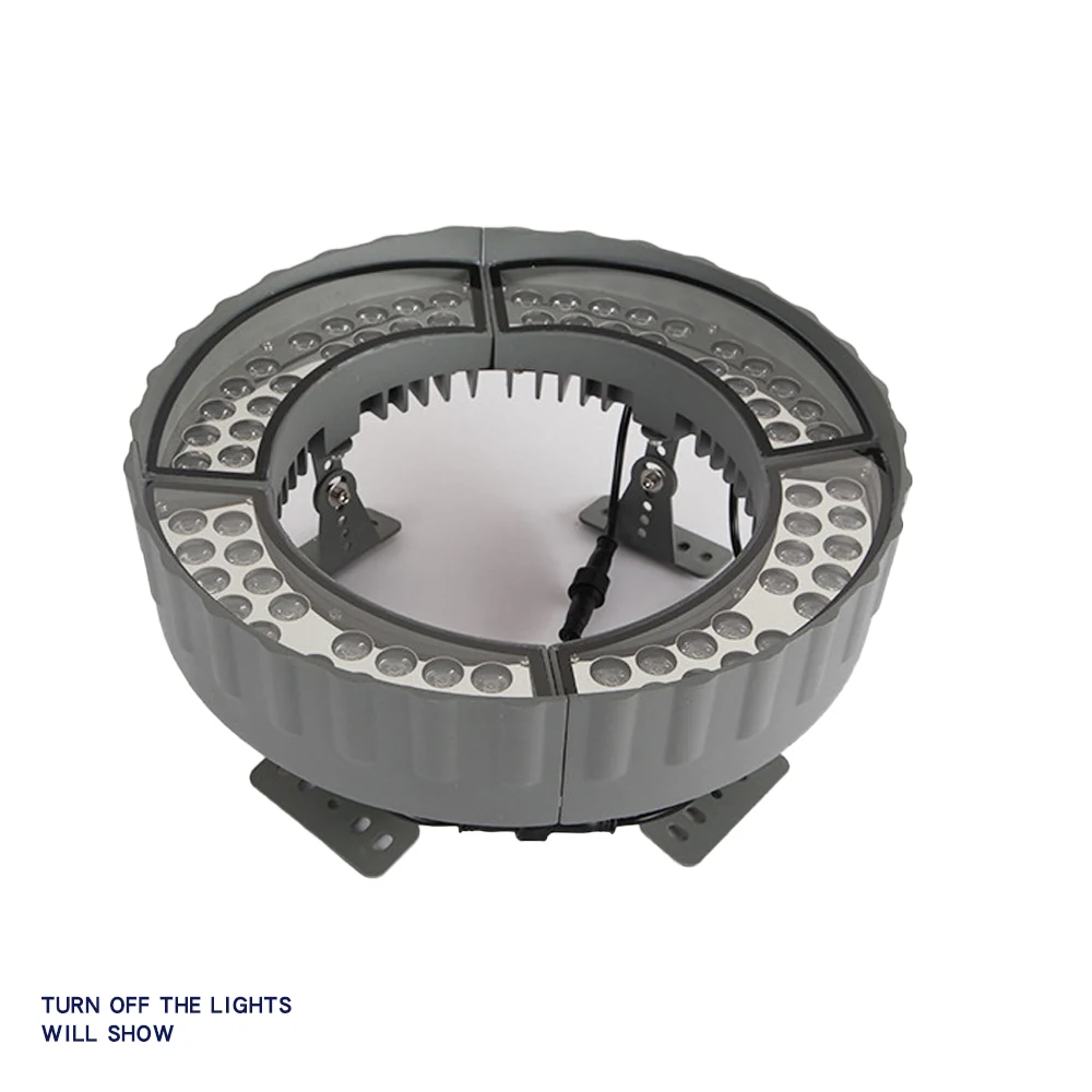 Set of four flood lights arranged in a row for facade lighting application
