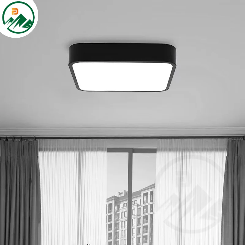 Installation view of the round ceiling panel light in a suspended office ceiling grid