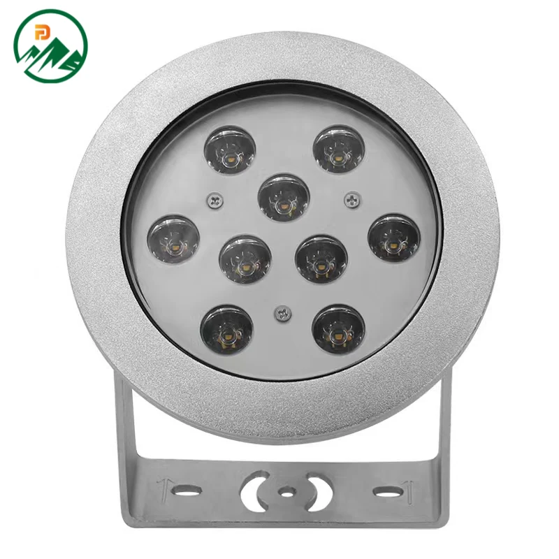 Underwater luminaire installed in a pool, showing the light beam beneath the water surface